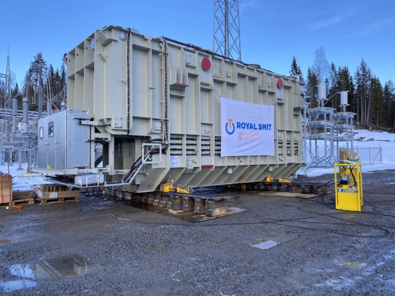 The 264-ton (240-ton) transformer approaches its final destination.