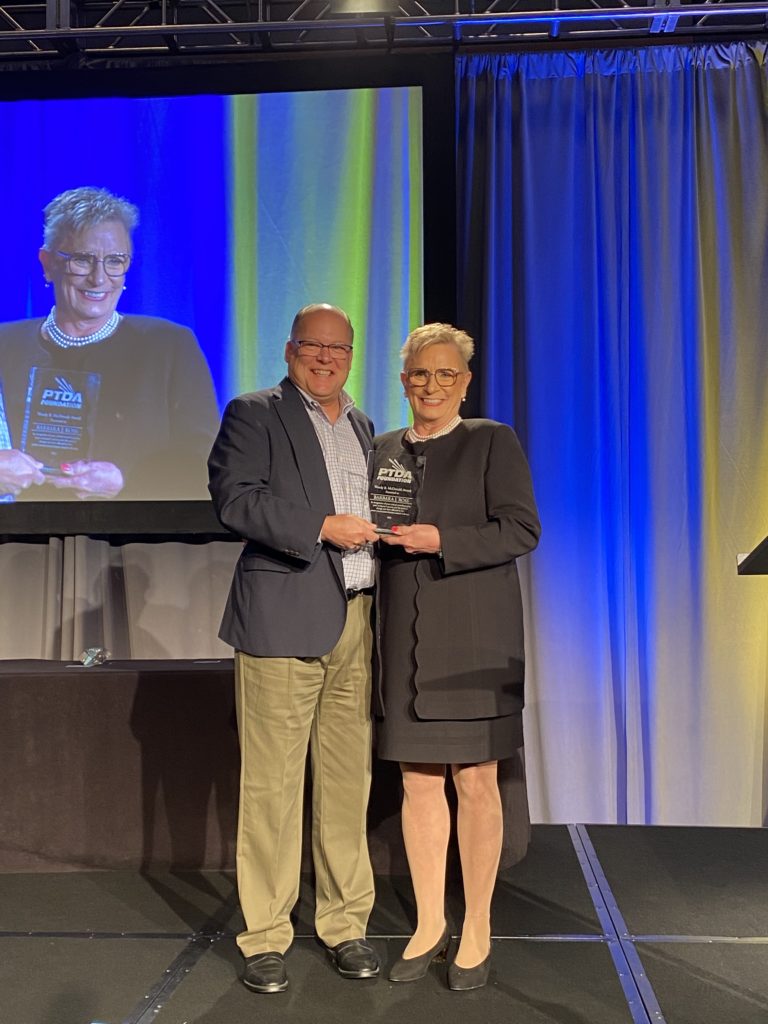 Barbara Ross headshot with award