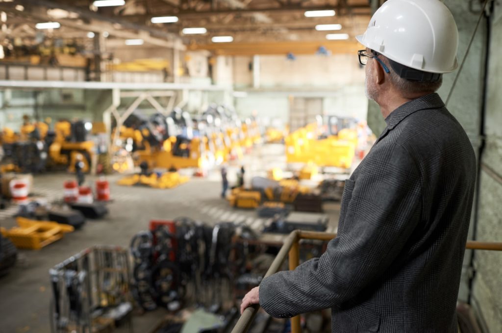 Engineer Watching Warehouse Lighting