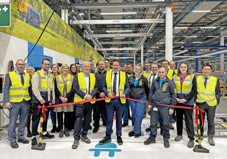 Atlas Copco Power Technique executive team together with the Production team during the opening of the line. image