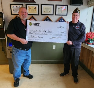 Rodger Mort, President of Packaging and Crating Technologies in Watertown, Conn. presents a $3,000 check to Post Commander Richard Noble of the Water-Oak VFW Post 5157