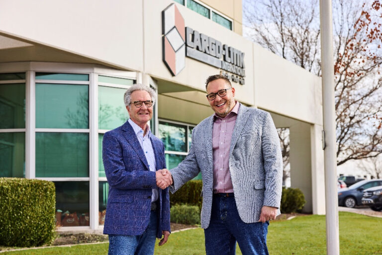 Photo caption (photo by Michael Kunde) - Scott Ogden, CEO and Owner of Cargo-Link, finalized the company’s acquisition with Mark McCullough, CEO of Gebrüder Weiss North America.