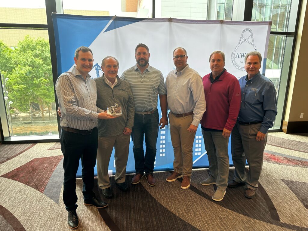 Ross Moloney, CEO, LEEA presents the award for the best contribution from a company or individual to #GLAD2023 to (left to right) Mazzella’s Tony Mazzella, CEO; Matt Mazzella, president; Eric Parkerson, vice president of rigging; Mike Lindsey, vice president of supply chain; and Jim Takacs, director of corporate supply chain.