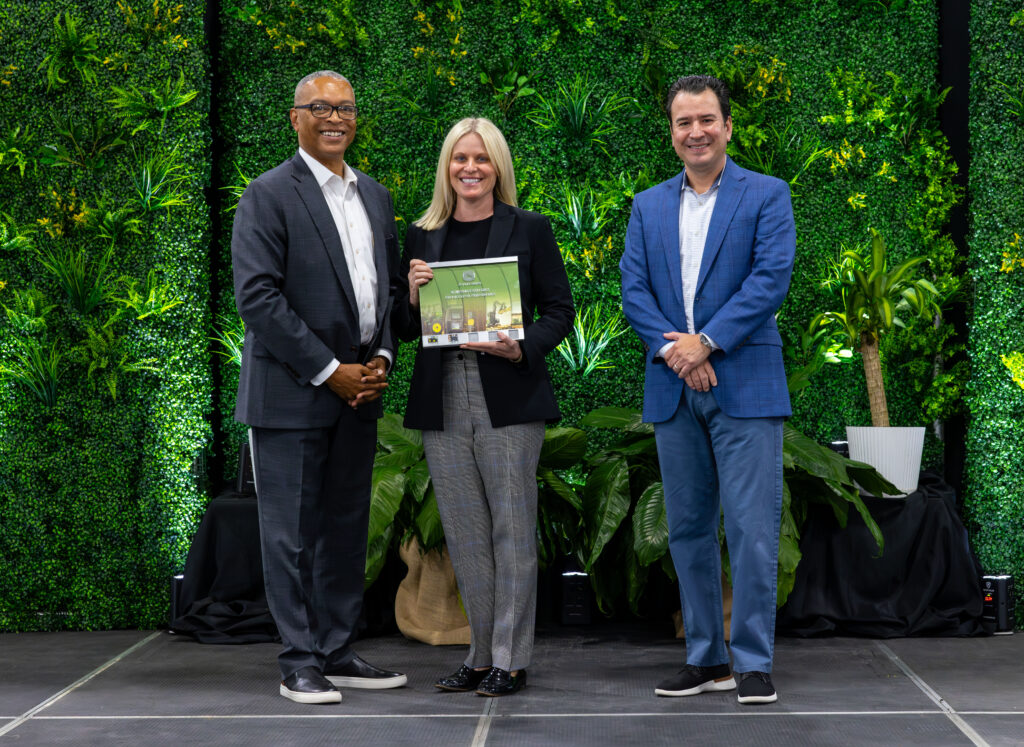 Partner Level Supplier award presented to ORBIS Corporation's Megan Mahoney, vice president, Industrial Strategic Sales (Center) by Wallas Wiggins, vice president, Global Supply Management & Logistics (Photo Left) and Eduardo Viera, director, Indirect Materials & Services (Photo Right) both of Deere & Company. The award was presented on April 11 in Moline, Illinois.