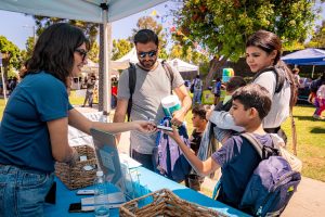 Chris Valle Photography, POLB, Scherer, event, outreach Back to school event at Scherer Park- sponsorship, community realtions, outrach, kids Scherer Park back to school community event image