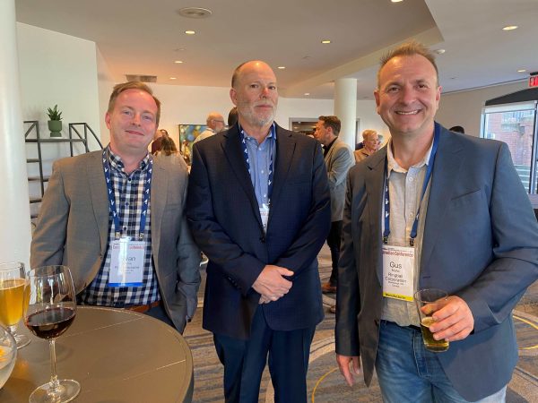 Ryan Horne, RotoPrecision, Inc., Gregg Robinson, RotoPrecision, Inc., and Gus Muho, Ringball Corporation, enjoy the opening reception.