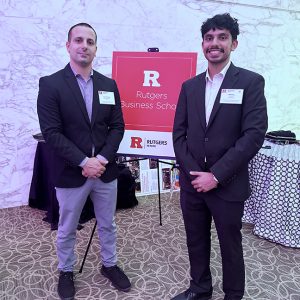 Nick Genovese, Gebrüder Weiss Branch Manager – New York, and Nikhil Walia, a Gebrüder Weiss scholarship recipient, at the 2025 Rutgers University – Newark scholarship recognition reception. image